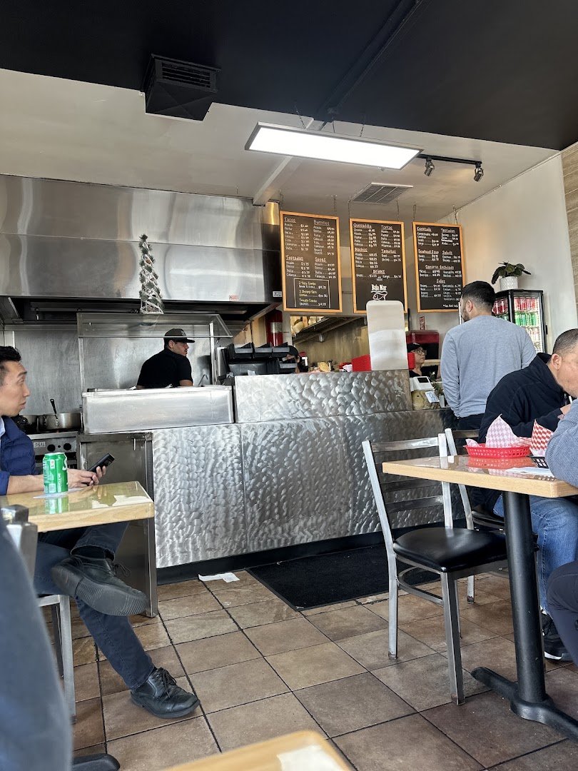 Takeaway counter beside a quiet dine-in area.